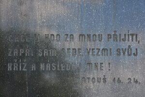 Czech inscription from Matthew 16:24, translated as "If any man will come after me, let him deny himself, and take up his cross, and follow me."